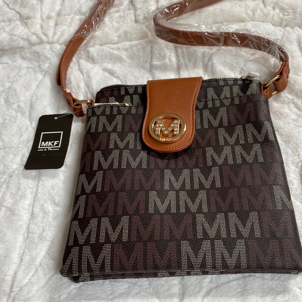 Great gift! NWT crossbody bag. Regifted